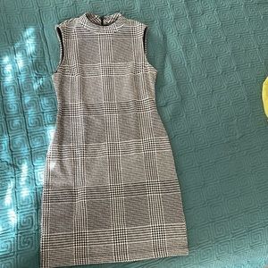 Black and white gently used dress.